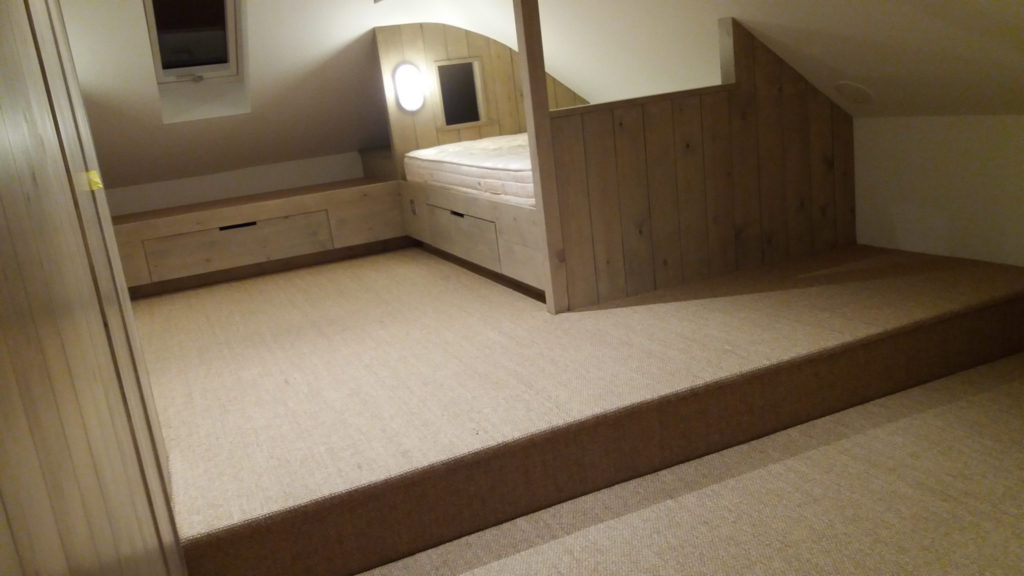 A sisal mini boucle carpet installation in Studland, Dorset. A sisal mini boucle carpet installation in Studland, Dorset.