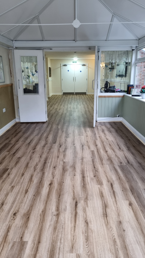 Solid oak pre-finished wood flooring planks.